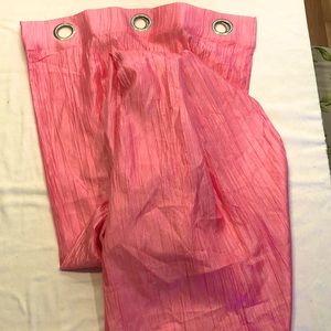 4 pink drapery panels.